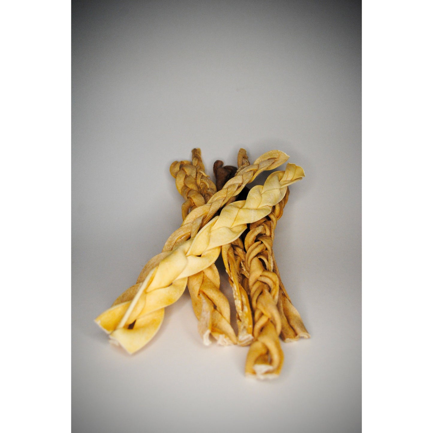 three braided dried beef skin