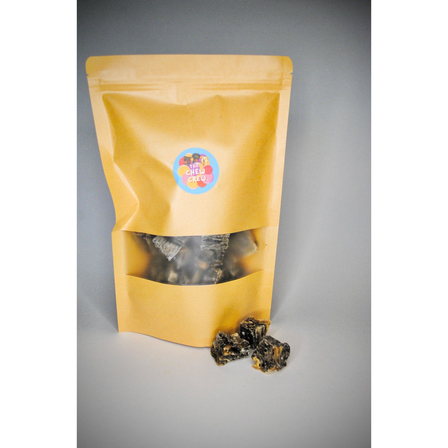 Yellow packaging bag with a colorful label on a gray background