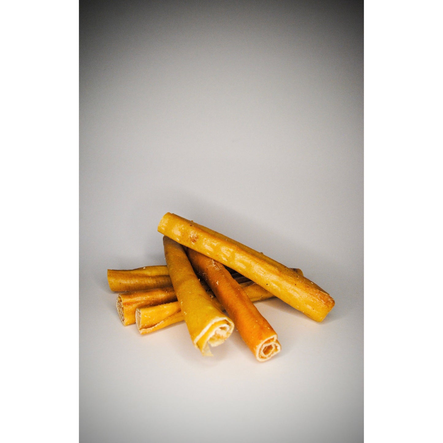 Dog pork rolls on a grey background